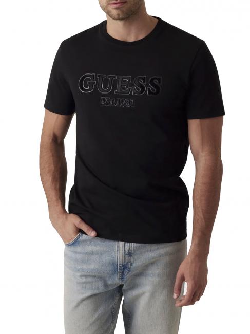 GUESS SS CN SPRAYED FLOCK LOGO  Camiseta de algodón jetbla - camiseta