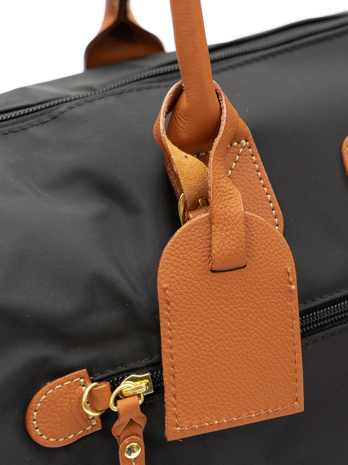 Bolso mochila negro con doble correa y cierres de clip para mujer milna
